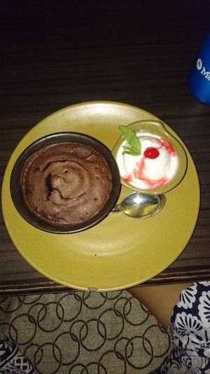 Chocolate cake with ice cream 🍦  at Places Restaurant and Bar in Kathmandu
