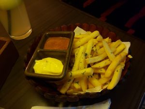 banana ketchup with French fries. good at Places Restaurant and Bar in Kathmandu