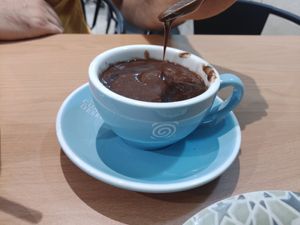 El mejor chocolate vegan para churros que he probado, super espeso at Cafeteria Riglos in Jaca