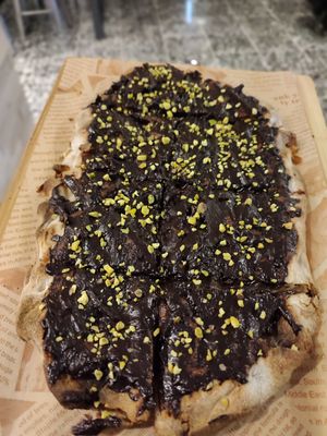 Crema al cacao e alla birra Porter con granella di pistacchi at Casa Birra Puddu  in Santa Giusta