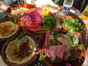 Shared plate for 2 people (falafel, hummus, baba ganoush, flatbread, 2 salads and some pickled vegetables) at Beirut Beirut in Munich