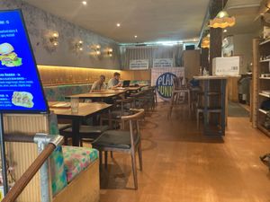 Inside: unlike their previous places, this branch has plenty of seating. at Plant Junkie - Front St in New York City