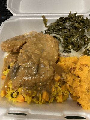 Sweet potato casserole, veggie rice, collards, and seitan chicken and gravy  at Eden's Vegans in Raleigh