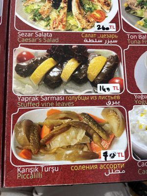 Stuffed vine leaves & pickled veg salad  at Kadırga Cafe Restoran in Istanbul
