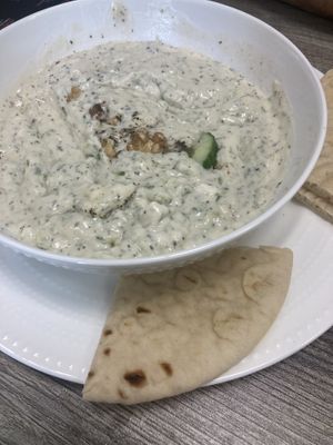 Maast-o-Khiyar - Persian cucumber, yogurt, and spice dip, served with hot pita bread.  at Neek Vegan in Duluth
