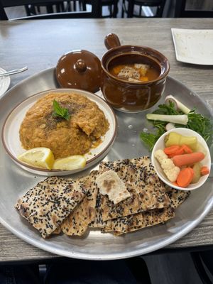 Entree - Persian Dizi: Mixed beans, chickpeas and potatoes mashed up and served with hot sangak bread and a side of tomato based broth and tofu.  at Neek Vegan in Duluth