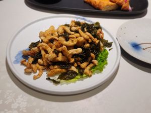 Green Tea flavoured fried white mushroom at Liansu World in Beijing