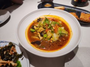 Poached eight ingredients in chili oil at Liansu World in Beijing