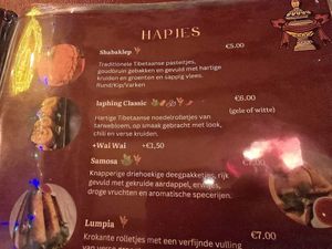 Vegan and allergenes noted on menu at Ama Tibetan Mom's Kitchen in Bruges