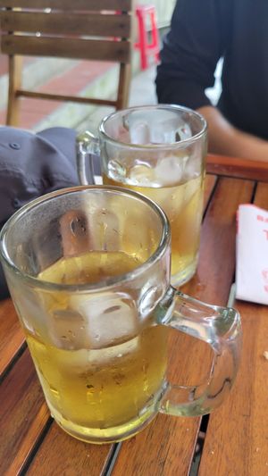 Free ice tea served by the friendly owner while we talked and waited for the sandwiches to be made at Bánh Mỳ Chay Tâm Trí in Da Nang