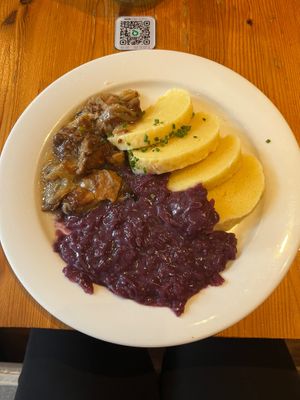 Seitan “výpečky” with potato dumplings and red cabbage at Sicily Cafe in Prague