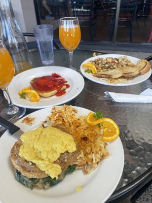 Croque monsieur florentine with just egg, strawberry French toast, tofu Provençal   at Ghini's French Caffe in Tucson