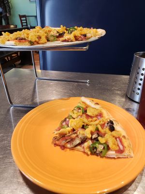 The have two types of vegan cheese, but I skipped that and got vegan mac and cheese on my pizza. Really good. Tasty sauce and light, flaky crust. I'd recommend this place to anyone. at Flying Saucer Pizza Company in Salem