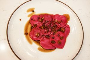 May Exclusive.
Our hearts raviolis get their fun color from beets.
Filled with goat cheese and chives, these decadent pasta are coated with brown butter and candied walnuts.
 at N.D.A Cuisine - Cloud Kitchen in Farmers Branch