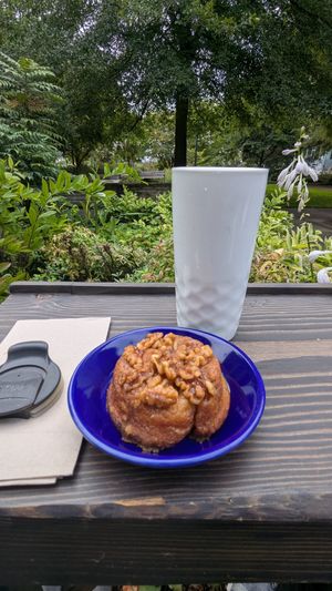 Sticky bun and chai in my own container at Our Spot in Portland