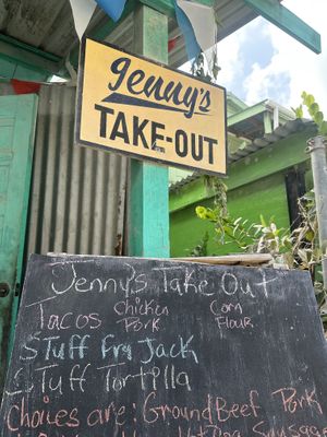 Sign out front  at Jenny's To Go Food in Caye Caulker