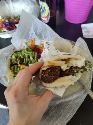 Falafel Sandwich  w a DIY side salad - I ate two bites before I remembered to take a photo 😋 at Falafel Bar in Manuel Antonio