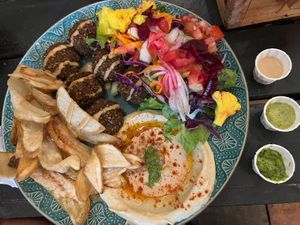 Falafel plate and several sauces   at Falafel Bar in Manuel Antonio
