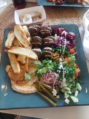 Falafel plate with different things from the salad bar at Falafel Bar in Manuel Antonio