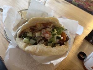 Falafel sandwich with added toppings from the falafel bar— so tasty! I recommend adding the local habanero hot sauce.    at Falafel Bar in Manuel Antonio
