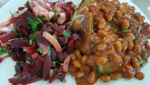 Beans dish with jacket potato, and beetroot salad at The Beano Restaurant in Guildford