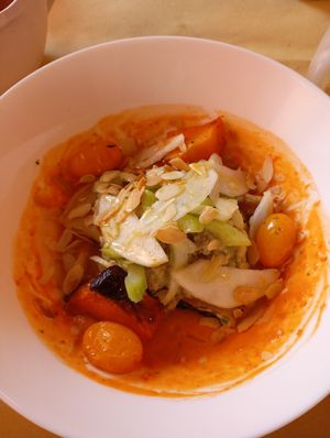 Vegan crepe. A wonderful combination of celery, pumpkins, almonds, green apples, cherry tomatoes and roasted eggplants. Very original! at È cucina Marrett in Bologna