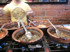 Ingredients are kept warm in clay pots. at Tacos Gus in Mexico City