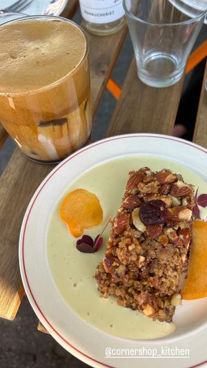Whipped iced latte and cherry cake with bitter almonds milk  at Cornershop  in Johanneshov