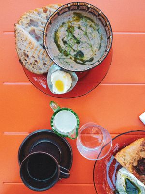 [Top] Soup of the day - Mushroom (oyster and lions mane) soup served with sourdough bread. 125 sek. [Bottom left] Decaf Chikoria coffee. 38 sek. [Bottom right] Tomato Galette. at Cornershop  in Johanneshov
