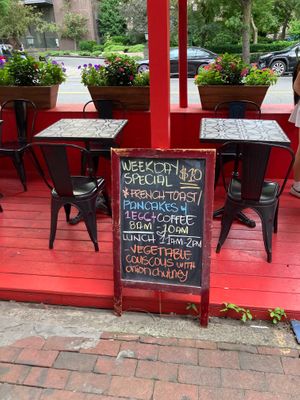 Placard, outside seating at Effy's Cafe in New York City