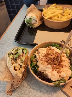 Coleslaw salad, fries, swiss wrap at Swing Kitchen in Zurich