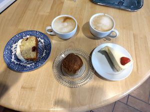 Cappucino with tasty sweets at Kenny's Vinyl Vault in Abertillery