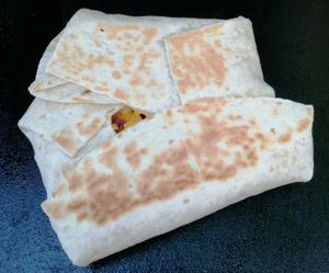 Julieann's Crunchy Wrap. smashed black beans, taco seasoned vegan beaf, salsa, vegan cheddar cheese & jalapenos at The Vegan Cheese Lady Cafe in Lafayette