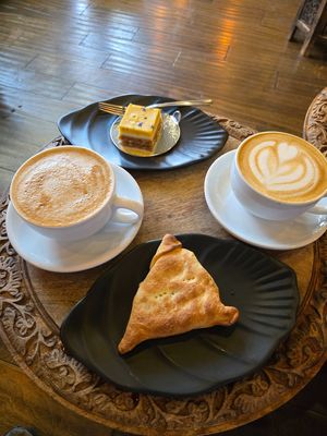 Soy milk on the left (he is still trying to perfect the heart) and oat milk on the left.  at Mohka House in Oakland
