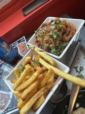 Chilli fries and vegan curry  at Momos in Liverpool