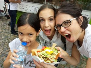 The family about to devour one of the great served dishes. at Tofu-Standpunkt - food truck in Freiburg
