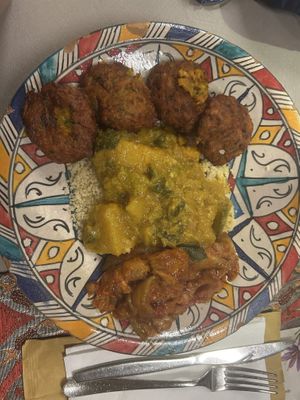 Cous cous, pakora e melanzane al sugo  at Peace ‘n' Spice  in Padua