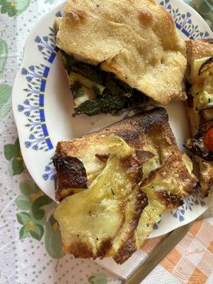 Potato & rosemary pizza & chicory-stuffed pizzaa  at BONA in Rome
