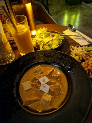Khao soi, salad and mango smoothie at Mercy Republic in Bangkok