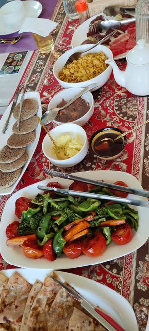 Vegan butter, maple syrup, veggies and buckwheat pancakes at Forest Boutique in Thimphu