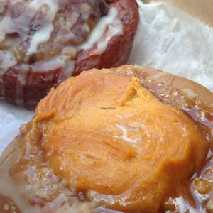 Pumpkin Pie donut in foreground, chocolate peanutbutter in background. It's even better than it looks, yes! at The Cinnamon Snail in New York City