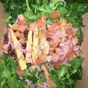 Maple Mustard Tempeh on quinoa lettuce/kale bed at The Cinnamon Snail in New York City