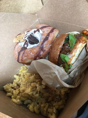 The mac n' cheese was amazing!!! And there were so many donuts and sweets. Great experience for some all American food! at The Cinnamon Snail in New York City