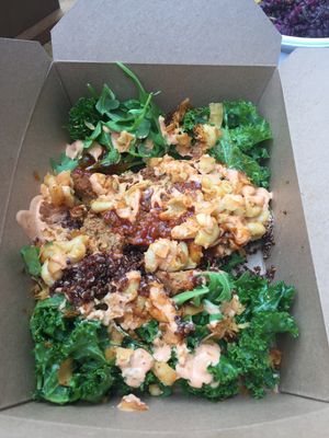 Burger box with salad instead of bun at The Cinnamon Snail in New York City