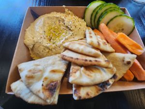 Hummus, veggies, pita bread at Brick & Bread in Broken Bow