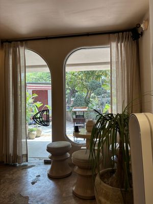 More indoor seating near entrance  at People Of Tomorrow in New Delhi