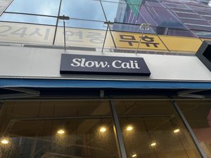 Sign outside  at Slow, Cali in Busan