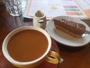 Coffee and vegan chocolate & raspberry torte at Bordo Lounge in Carlisle