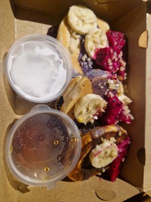 Choc stuffed pancakes, with coconut cream and syrup at O Baba Vegan in Denpasar