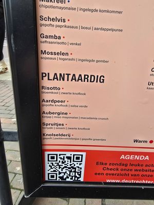 On street sign at De Utrechter Stadsbrasserie en Bar in Utrecht